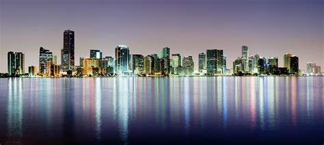 Miami And Brickell City Skyline At Photograph by Deejpilot