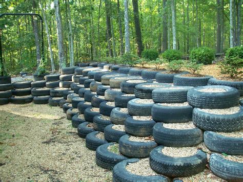 Pin by Ellen Vaught on Landscape | Tire garden, Retaining wall ...