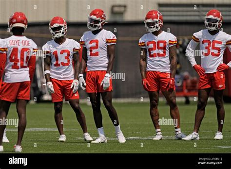 Kansas City Chiefs defensive players listen to instructions during the NFL football team's ...