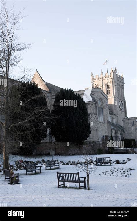 Christchurch Priory in the snow from the gardens Stock Photo - Alamy