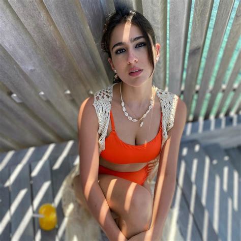 [PHOTOS] Sara Ali Khan dons tangerine bikini to flaunt her toned body in the Maldives