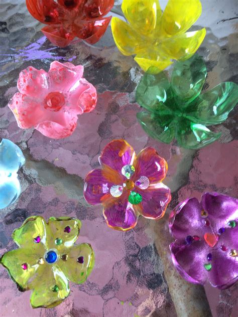 Beautiful flowers made from plastic bottles | Flower making, Crafts, Beautiful flowers