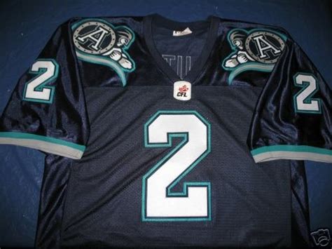 AUTOGRAPHED DOUG FLUTIE ARGONAUTS ARGOS CFL JERSEY XXL | #39017426