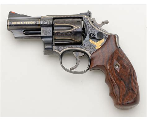 Smith + Wesson Model 29 – 3 .44 mag. D.A. Revolver with 3” barrel, # ALB5897. Finely engraved and mu