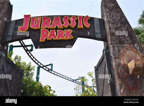 Universal studios Singapore, Asia, 11th august, 2019: entrance gate of Jurassic park in the ...