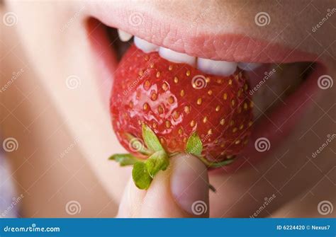 Strawberry Bite stock photo. Image of juicy, bite, lips - 6224420