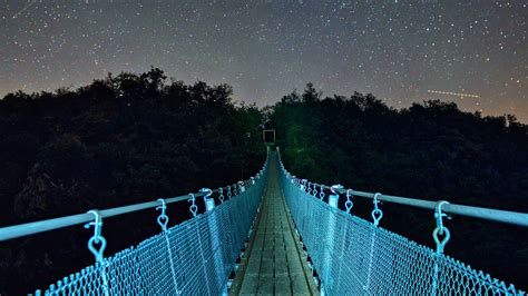 Download wallpaper 3840x2160 bridge, starry sky, stars, trees, night 4k uhd 16:9 hd background