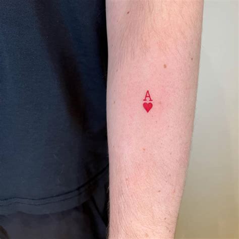 Minimalistic Ace of Hearts tattoo done on the forearm.