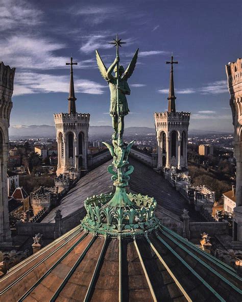 The statue of Saint Michael (Archangel Michael) on the roof of the ...