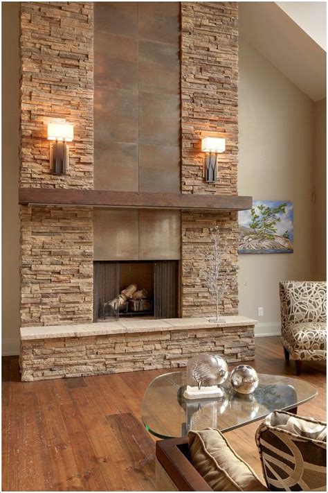 Fireplace with sconces. Wow. Stacked stone fireplace. | Modern stone fireplace, Stone fireplace ...