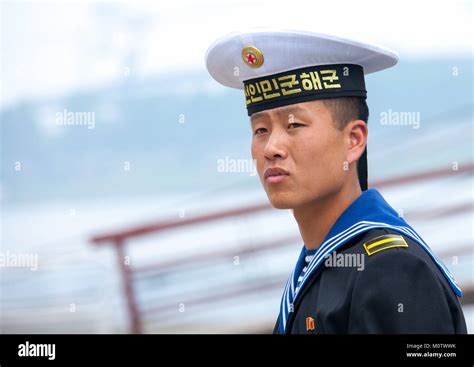 North Korean navy sailor in front of the us spy boat Uss Pueblo ...