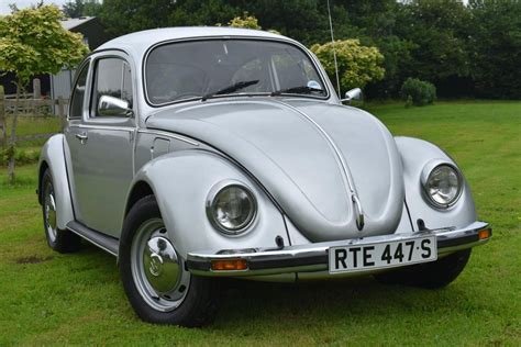 A 1977 Volkswagen Beetle Silver Jubilee limited edition, registration number RTE 447S, silver. The S