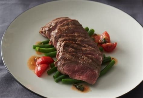 Lamb backstrap with tomato, basil and parmesan sauce - Real Recipes from Mums