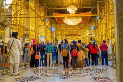 DELHI, INDIA - SEPTEMBER 19, 2017: Beautiful Golden Walls Inside Of The Temple With Crowd Of ...