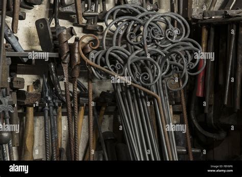 Blacksmith tools in a forge Stock Photo - Alamy