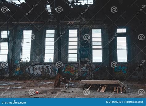 An Old Abandoned Industrial Area with Graffitis Stock Photo - Image of ...