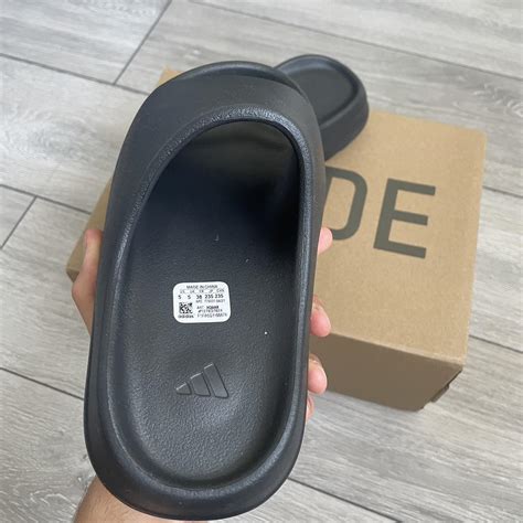 Yeezy Slides NEW Uk 5 Box slightly damaged DM... - Depop