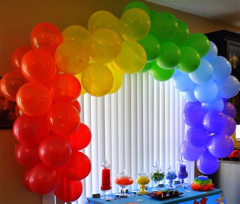 balloons rainbow..We used a balloon arch strip from Party City to tie the balloons to, then ...