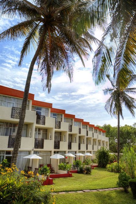 The rooms here at Kombo Beach Hotel in The Gambia are set within three-storey buildings amongst ...