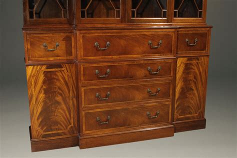 Baker Furniture company Colonial Revival styled breakfront/secretary in mahogany.