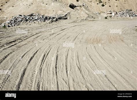 Tire tracks in the sand Stock Photo - Alamy