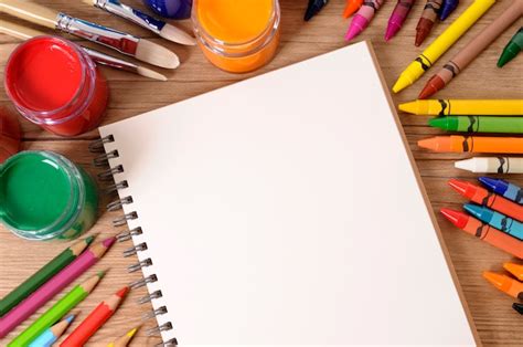 Free Photo | School notebook with art equipment