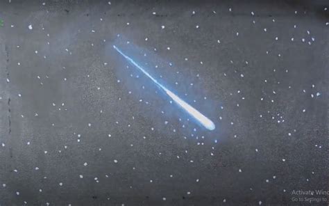 a chalk drawing of a comet in the sky