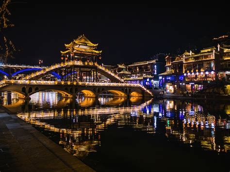 Premium Photo | Scenery view in the night of fenghuang old town .phoenix ancient town or ...