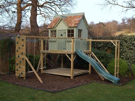 elevated playhouse | Otter Cottage wooden playhouse climbing frame | 1000 in 2020 | Backyard ...