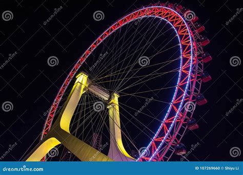 Ferris wheel at night stock photo. Image of recreation - 107269660