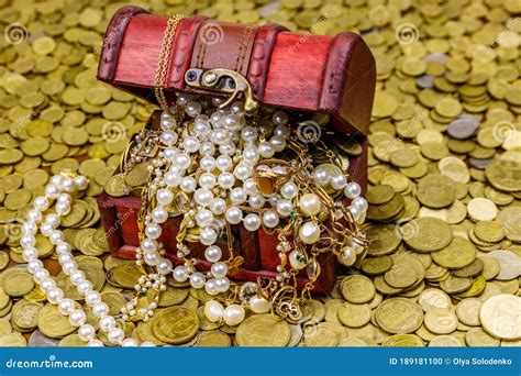 Vintage Treasure Chest Full of Gold Coins and Jewelry on a Background of Golden Coins Stock ...