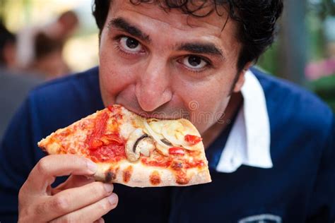 Hungry Man Eating Slice of Pizza Stock Image - Image of bite, close: 20514741