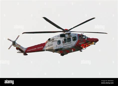 HM Coastguard Helicopter flying over London, AgustaWestland AW189 G-MCGU used by HM Coastguard ...