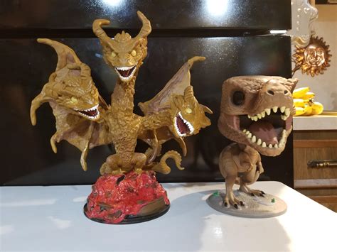 Size comparison of custom King Ghidorah pop to 10 inch tyrannosaur Rex pop. : funkopop