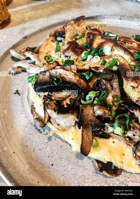 delicious mushroom and cheese omelette Stock Photo - Alamy