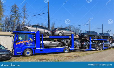 Car Carrier Trailer Transports Cars On Highway On Sunset Background ...