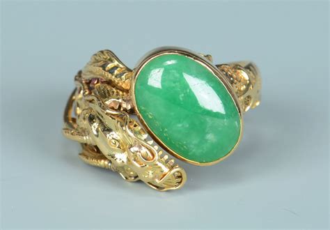 Lot 270: 14k and 18k Gold Jade Rings