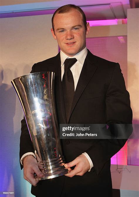 Wayne Rooney of Manchester United poses with the Players' Player of ...