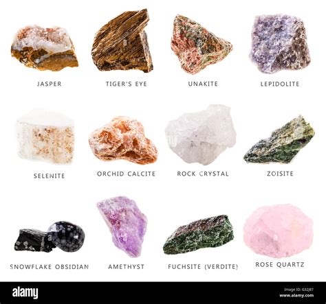 a collection of different semi precious minerals isolated over a white ...