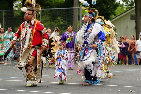 Male Native Americans Of Hochunk Nation Performing Pow Wow In Front Of An Audience Stock Photo ...