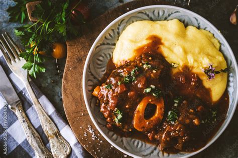 Osso bucco Beef Stew with Polenta Stock Photo | Adobe Stock