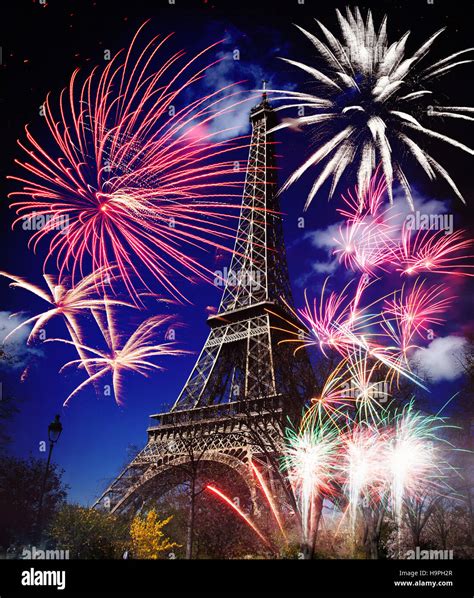 Eiffel Tower At Night With Fireworks Wallpaper