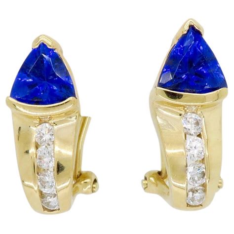 Diamond and Tanzanite Omega Back Earrings at 1stDibs