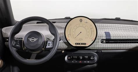 The focus of the Mini's new Cooper EV is a giant circular OLED display on the dashboard