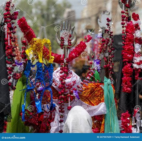 Shia Muslims during Muharram with Alam and Blooded Cloths Stock Image - Image of muslims ...