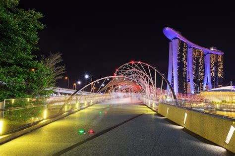 Premium Photo | The helix bridge at night in singapore