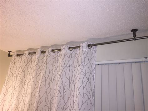 Need drapes to hang over vertical blinds? Mount rod to ceiling. Rod from Target. | Blinds design ...