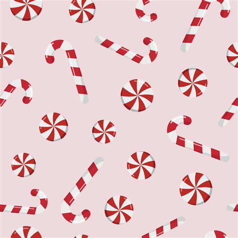 Winter Christmas seamless pattern with candy canes and round swirl candy on beige background ...