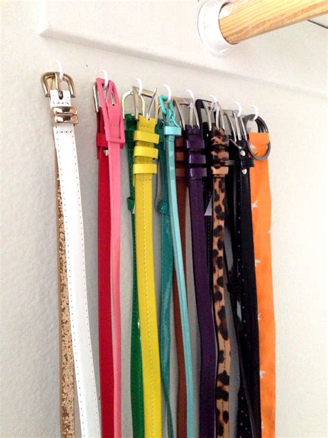 Hooks on the wall in the closet to organize belts. | Belt organizer, Closet organization ...