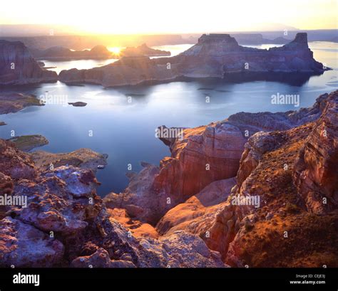 Sunrise over Gunsight Butte on Gunsight Bay on Lake Powell in Glen Canyon National Recreation ...